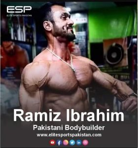 Ramiz Ibrahim posing with his trophies, showcasing his achievements as a three-time World Champion in bodybuilding